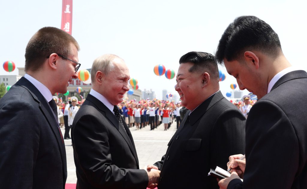 Vladimir Putin and Kim Jong un