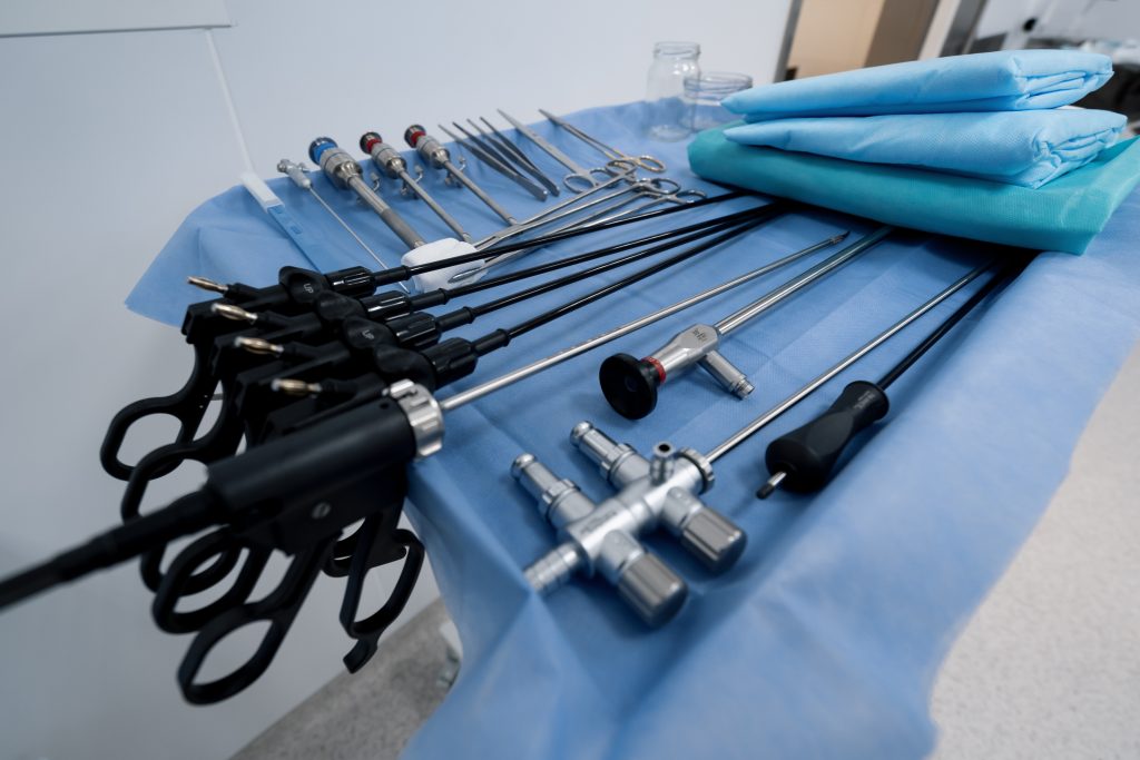 sterile surgical instruments lie on the table before the operation in operating room laparoscope scalp scissors