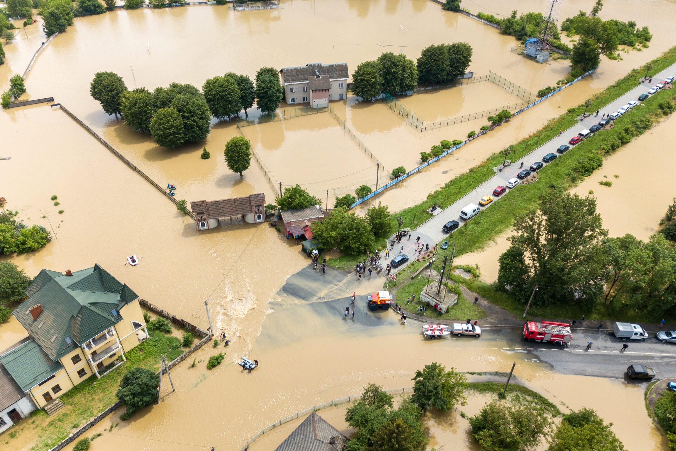 A flood has caused a road block, a situation a response team would manage.